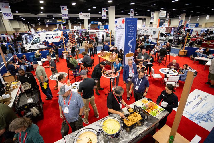 attendees and exhibitors interacting and enjoying the Welcome Reception in a large exhibit hall | Texas EMS Conference